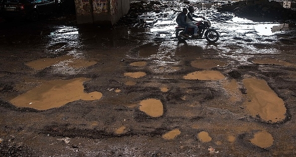 Potholes Appear After A Spell Of Heavy Rains (Pratik Chorge/Hindustan Times via Getty Images)