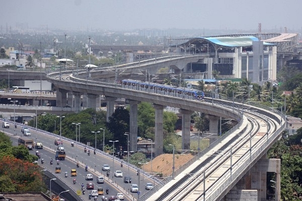 A Chennai Metro train leaves the Alandur station near the Kathipara cloverleaf interchange (Jaison G/India Today Group/Getty Images)