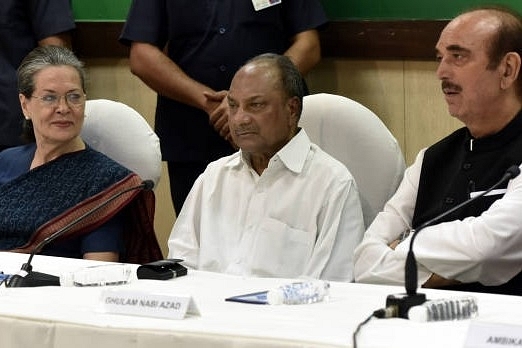 Sonia Gandhi, AK Antony (C) and Ghulam Nabi Azad (R) presides over the CWC meeting. (Mohd Zakir/Hindustan Times via Getty Images)