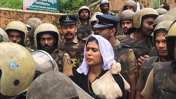 Kerala police accompanying activist Rehana Fathima in Sabarimala (@ANI/Twitter)