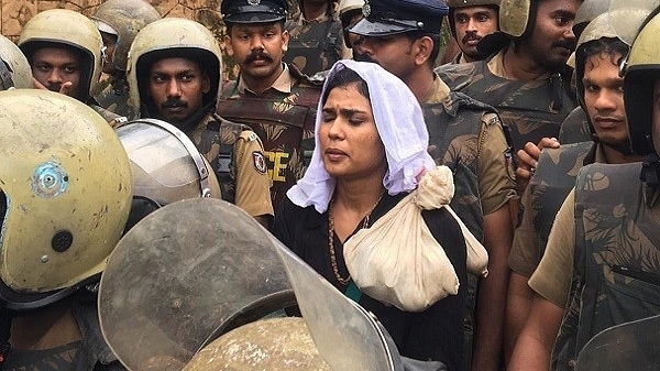 Kerala police accompanying activist Rehana Fathima in Sabarimala (@ANI/Twitter)