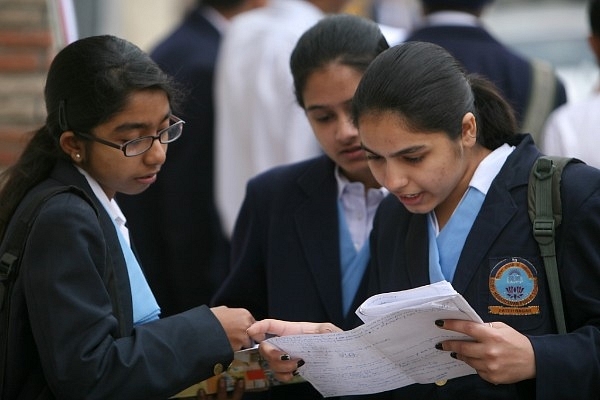 Students outside their examination centre. (Shekhar Yadav/India Today Group/Getty Images)