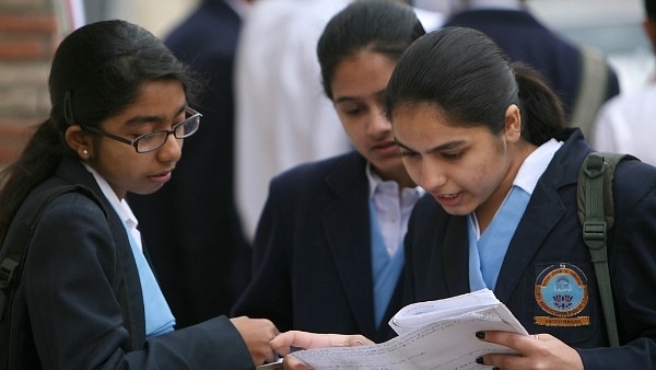 Grade XII students rivising in the last minute outside their examination centres. (Representative image) (Shekhar Yadav/India Today Group/Getty Images)