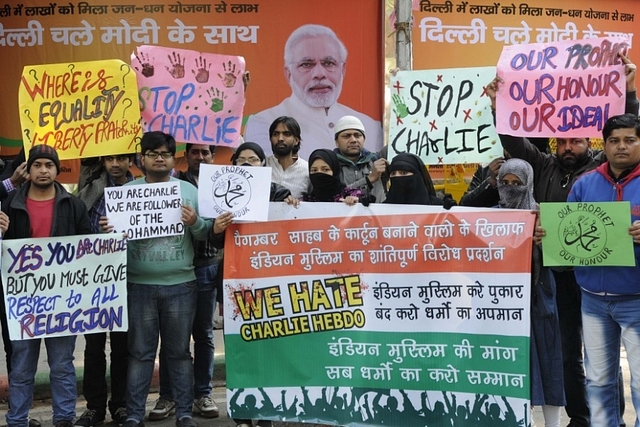 Members of All India Muslim Facebook Page protest against the publication of cartoons depicting Prophet Mohammad in French satirical weekly Charlie Hebdo at Jantar Mantar on January 31, 2015 in New Delhi, India. (Photo by Mohd Zakir/Hindustan Times via Getty Images)