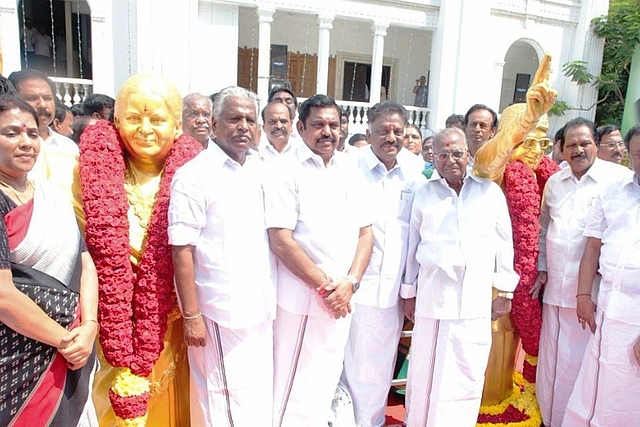 AIADMK leaders with statues dedicated to former leaders J Jayalalitha and MGR.&nbsp;