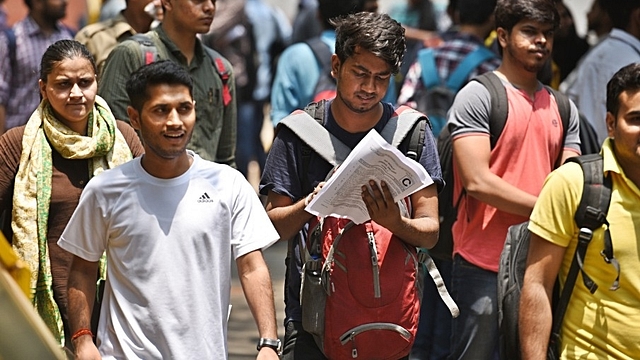 Union Public Service Commission aspirants are seen outside an examination centre after the UPSC preliminary exam 2018 (Photo by Raj K Raj/Hindustan Times via Getty Images)