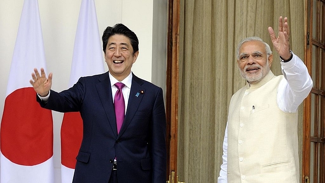 PM Modi with PM Shinzo Abe. (Sonu Mehta/Hindustan Times via Getty Images)