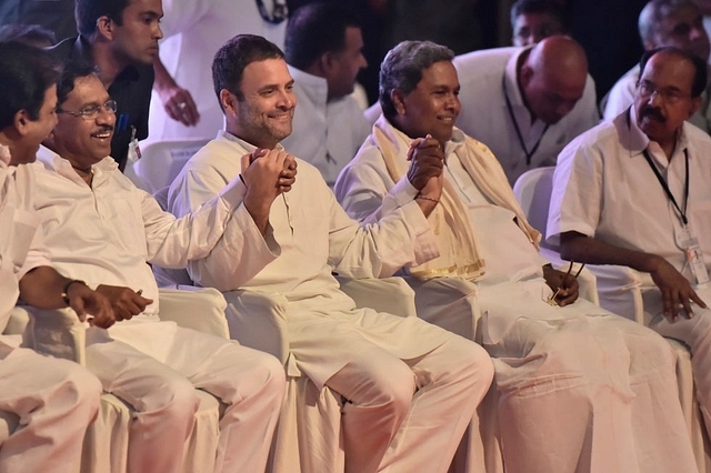 Dr. G. Parameshwara, Congress President Rahul Gandhi and Ex-CM Siddaramaiah during Congress delegate meeting at Jnana Jyoti Auditorium on June 12, 2017 in Bengaluru. (Photo by Arijit Sen/Hindustan Times via Getty Images)