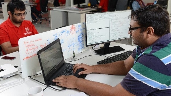 Employees at an IT startup in Bengaluru (Hemant Mishra/Mint via Getty Images)