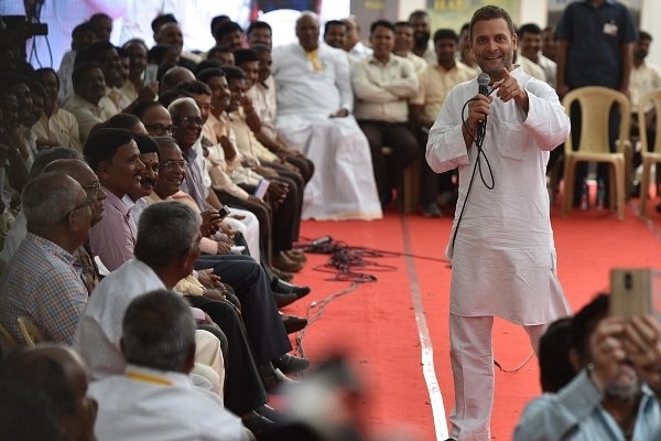 Congress President Rahul Gandhi meeting HAL employees at Minsk Square on 13 October  2018 in Bengaluru. (Photo by Arijit Sen/Hindustan Times via Getty Images)