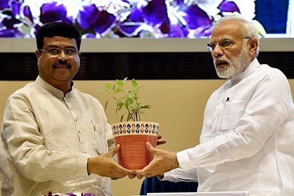 Prime Minister Narendra Modi and Petroleum Minister Dharmendra Pradhan (Photo by Mohd Zakir/Hindustan Times via Getty Images)