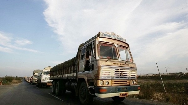 Highway trucks (Vikas Khot/Hindustan Times via Getty Images)