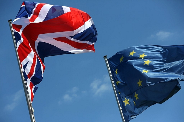 A British Union Jack (L) and European Union flag. (Adam Berry/GettyImages)&nbsp;