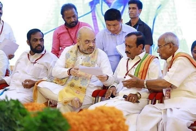 Amit Shah meeting Kerala BJP leaders during July 2018 visit (pic via twitter @advssuresh  )