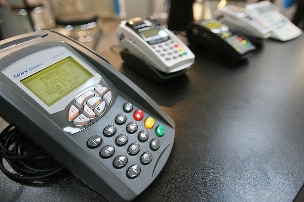 Card payment terminals are on display digital IT and telecommunications fair (JOHN MACDOUGALL/AFP/GettyImages)