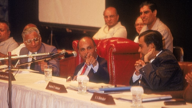 Dhirubhai Ambani with his son, Mukesh. (Shah Ashesh/The India Today Group/Getty Images)