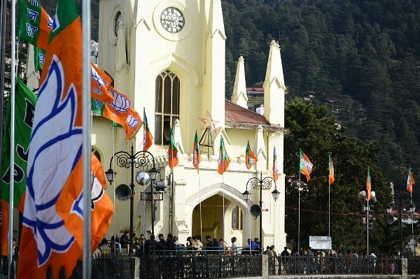  BJP flags welcome Prime Minister Narendra Modi at the Ridge in Shimla on 26 December  2017. (Photo by Deepak Sansta/Hindustan Times via Getty Images)