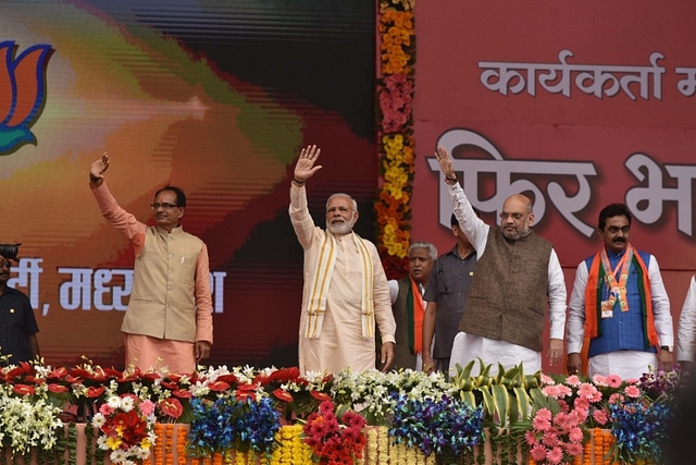  Prime Minister Narendra Modi along with BJP President Amit Shah and Madhya Pradesh Chief Minister Shivraj Singh Chouhan during the BJP party workers conclave called ‘Kar-yakarta Mahakumbh’, at Jamboree Ground, on  25 September 2018 in Bhopal (Mujeeb Faruqui/Hindustan Times via Getty Images)