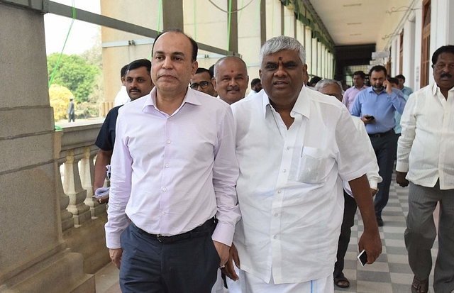 BM Farooq, Janata Dal (S) MLC with HD Revanna at Vidhana Soudha in Bengaluru. (Photo by Arijit Sen/Hindustan Times via Getty Images)