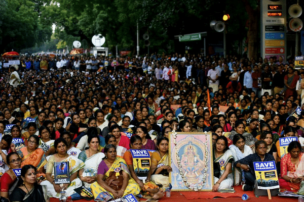 Members of Ayyappa Dharma Samrakshana Samithi hold placards during a protest against the Supreme Court verdict on the entry of women of all ages into the Sabarimala Lord Ayyappa Temple. (Amal KS/Hindustan Times via Getty Images)