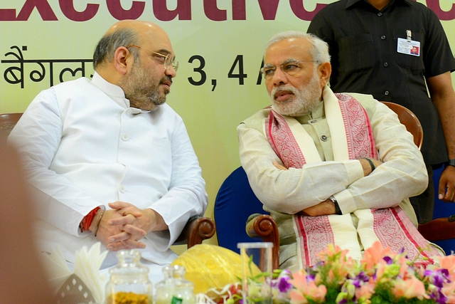 BJP President Amit Shah and PM Narendra Modi during the BJP two-day National Executive meeting at Hotel Ashok in Bengaluru, India. (Hemant Mishra/Mint via Getty Images)&nbsp;