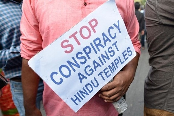 Members of Sabarimala Ayyappa Seva Samajam take part in a protest near Jantar Mantar in New Delhi against the Supreme Court verdict on the entry of women of all ages into the Sabarimala Lord Ayyappa Temple. (Biplov Bhuyan/Hindustan Times via GettyImages)