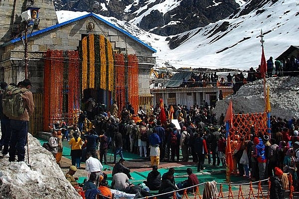 Hindu devotees waiting for their turn outside Kedarnath shrine on April 24, 2015 at Kedarnath. (Photo by Vinay Santosh Kumar/Hindustan Times via Getty Images)