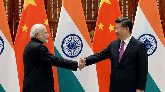 PM Modi with Chinese President-For-Life Xi Jinping. (Wang Zhou - Pool/Getty Images)