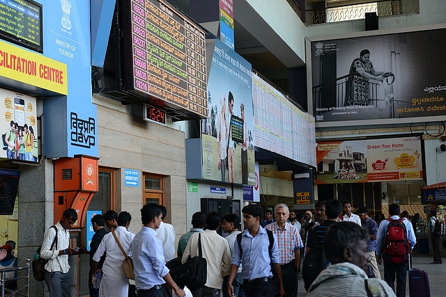 Passengers seeking information about trains creates kiosk at the city’s Railway Station, on February 24, 2015 in Bengaluru. (Photo by Hemant Mishra/Mint via Getty Images)