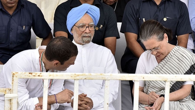 Rahul Gandhi, Manmohan Singh and Sonia Gandhi. (Sonu Mehta/Hindustan Times via Getty Images)