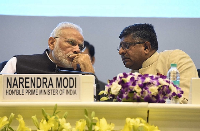 PM Modi with Law Minister, Ravi Shankar Prasad.