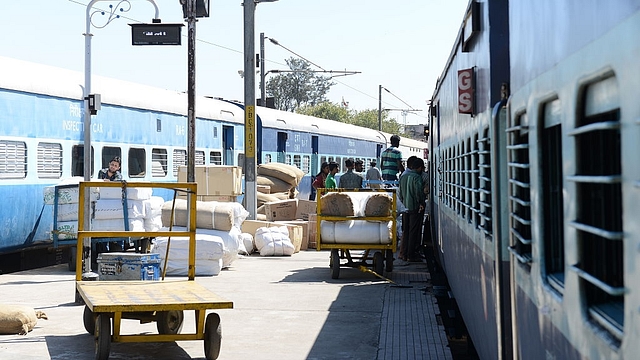 A Passenger looking from window of train at Bangalore railway station, on February 24, 2015 in Bengaluru, India. (Hemant Mishra/Mint via Getty Images)