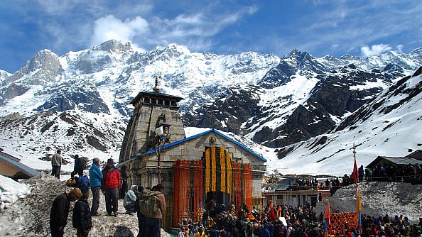 Char Dham pilgrims awaiting their turn to pray at the Kedarnath temple. (Vinay Santosh Kumar/Hindustan Times via Getty Images)