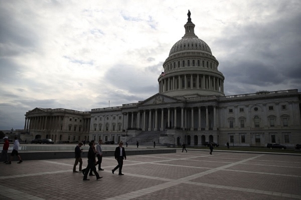 Clouds pass over the US Capitol in Washington, DC. (Mark Wilson/Getty Images)