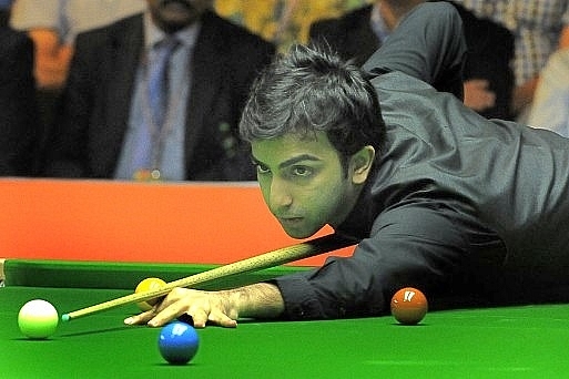 Indian cueist Pankaj Advani in action at World Ranking Snooker Indian Open 2013 (Sunil Saxena/Hindustan Times via Getty Images)