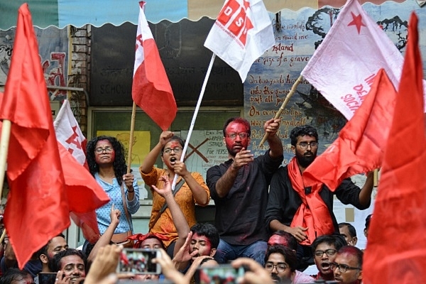 Students celebrating after JNU Students’ Union election results were announced. (K Asif/India Today Group/Getty Images)