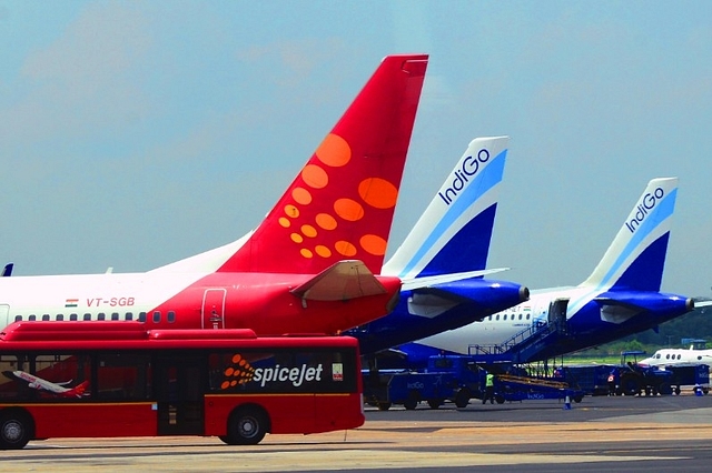 The picture featuring planes of various airlines parked at the IGI airport on July 25, 2013 in New Delhi, India. (Photo by Ramesh Pathania/Mint via Getty Images)