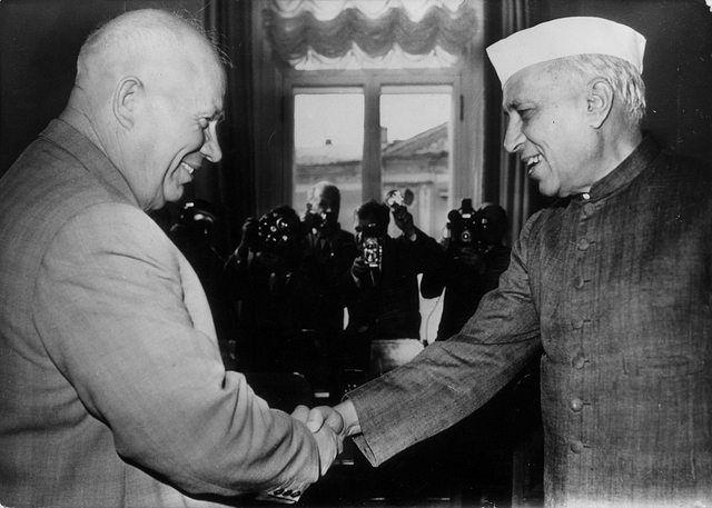 Jawaharlal Nehru  shakes hands with then Soviet premier Nikita Khrushchev in Moscow. Keystone/GettyImages)&nbsp;