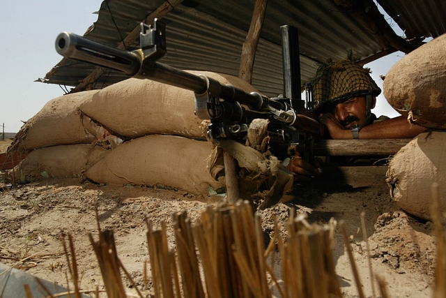 Soldier at the border bunker (Photo by Paula Bronstein/Getty Images)&nbsp;