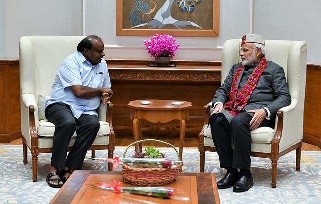 Karnataka Chief Minister HD Kumaraswamy with Prime Minister Narendra Modi in New Delhi on December 27, 2018. Image courtesy of twitter.com/CMofKarnataka.&nbsp;