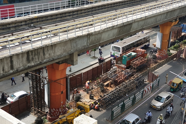 Repair works in damaged pillar near Trinity station ( @sounava /image via twitter)