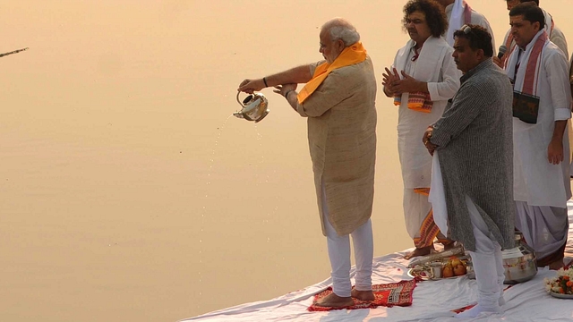 Prime Minister Narendra Modi performing Ganga aarti pooja after cleaning Assi ghat on 8 November 2014 in Varanasi, India. (Ashok Dutta/Hindustan Times via Getty Images)&nbsp;