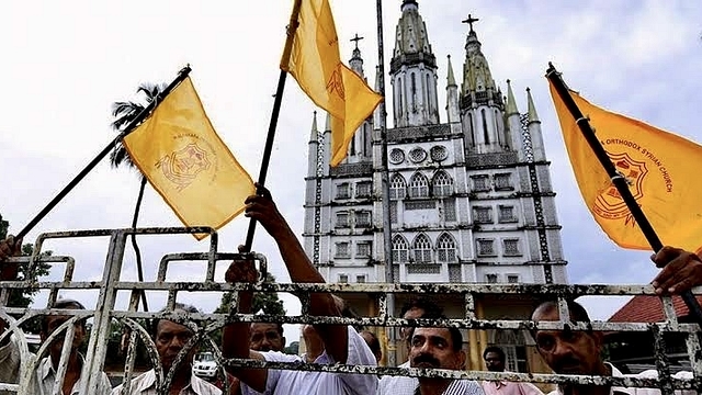 Protests fume in Piravom over Supreme Court’s ruling to handover Jacobite church to Orthodox faction (Pic: Twitter)