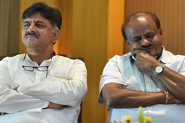 Congress Leader D K Shivakumar - left, Karnataka Chief Minister H D Kumaraswamy - Right (Arijit Sen/Hindustan Times via Getty Images)