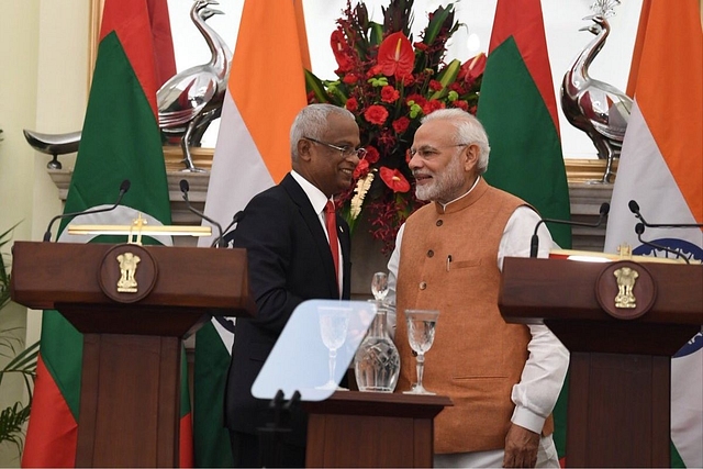 PM Narendra Modi (right) and President Solih (left). (@MEAIndia/Twitter)