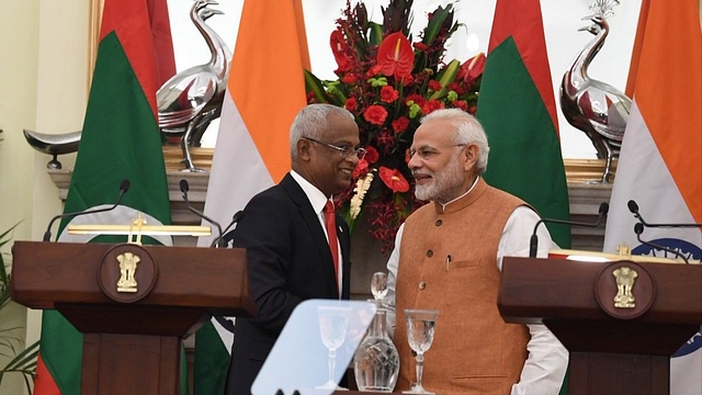 PM Narendra Modi (right) and President Solih (left). (@MEAIndia/Twitter)