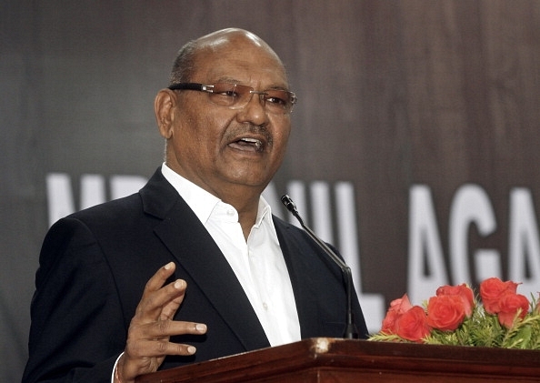 Industrialist Anil Agarwal speaking to college students in Delhi. (Photo by Sanjeev Verma/Hindustan Times via Getty Images)