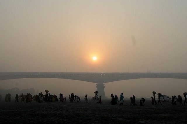 Devotees return from Ganga river after completing their rituals of Chatth Mahaparva festival at river Ganga, on November 14, 2018 in Patna. (Photo by Parwaz Khan/Hindustan Times via Getty Images)