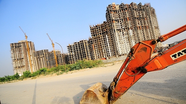 An under construction Amrapali Group building from 2011. (Photo by Pradeep Gaur/Mint via Getty Images)