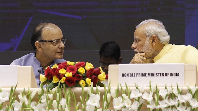 PM Narendra Modi with  Arun Jaitley. (Virendra Singh Gosain/Hindustan Times via Getty Images)